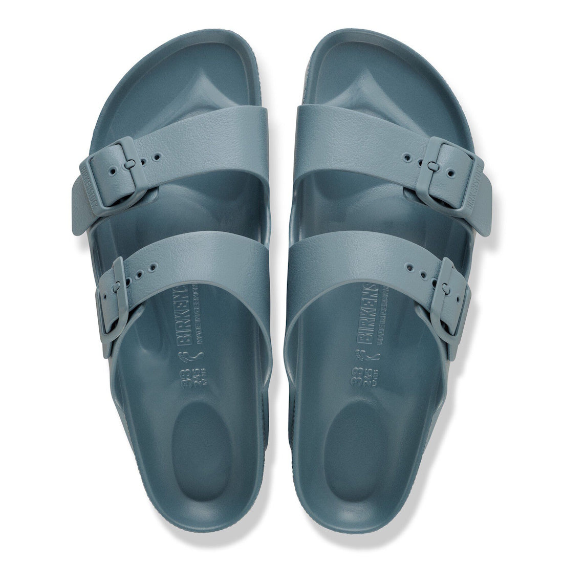 A pair of BIRKENSTOCK Arizona EVA sandals in Basalt Grey (Regular Width) with two adjustable buckle straps, seen from above and placed side by side. These waterproof sandals offer comfort and style for everyday wear., 52015, 4067707645022, 4067707645060, 