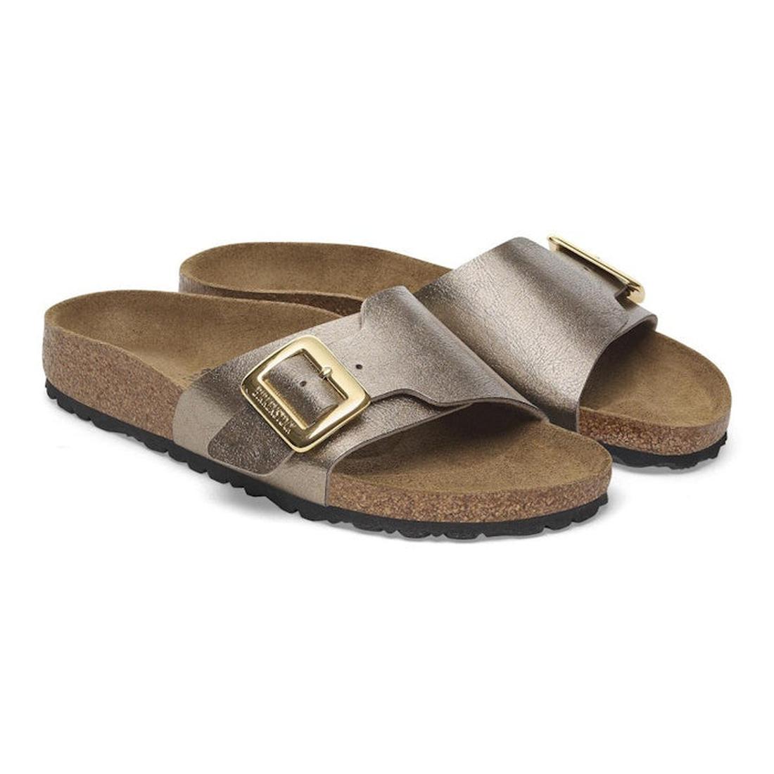 A pair of Birkenstock Womens Catalina Cushion Buckle Birko Flor Graceful Taupe slide sandals in regular width, featuring wide straps, large buckles, a supportive cork-latex footbed, and black rubber soles., 4067707018482, 4067707018529, 4067707018567, 406