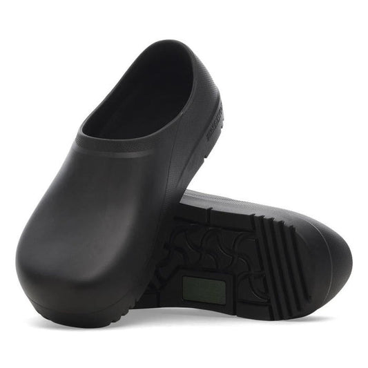 Pair of blackEVA Profi Birki Birkenstock clogs for hospitality or nuresing on a white background. Showing the front and inner side of one foot and the outer sole of the other foot.