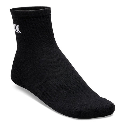 The BIRKENSTOCK Crew Ankle Sock in Black is crafted from a comfortable cotton blend, featuring a ribbed cuff and a small white logo near the top, and is displayed on a plain white background.