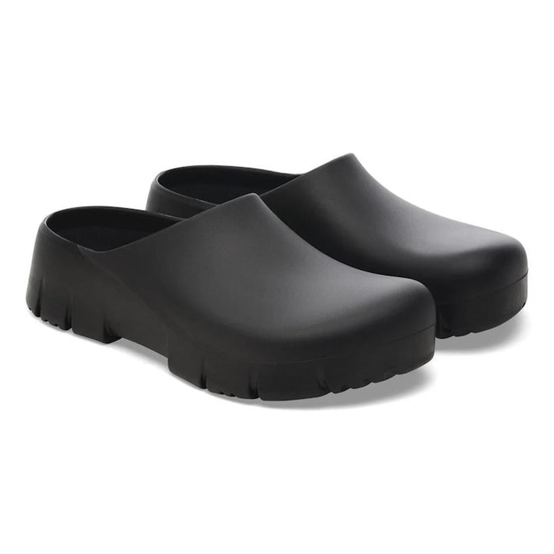A pair of BIRKENSTOCK Super Birki 2.0 Polyurethane clogs in black, regular width, with slip-resistant textured soles and smooth uppers, shown side by side on a white background., 50301, 4061418845184, 4061418845221, 4061418865267, 4061418868336, 406141884
