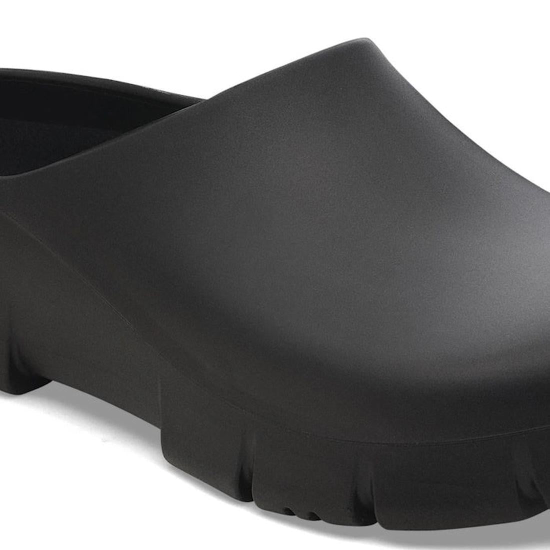 A close-up of the BIRKENSTOCK Super Birki 2.0 Polyurethane Black Regular Width, a slip-resistant, lace-free clog with a thick sole and minimalistic design—ideal for kitchens and all-day comfort., 50301, 4061418845184, 4061418845221, 4061418865267, 4061418