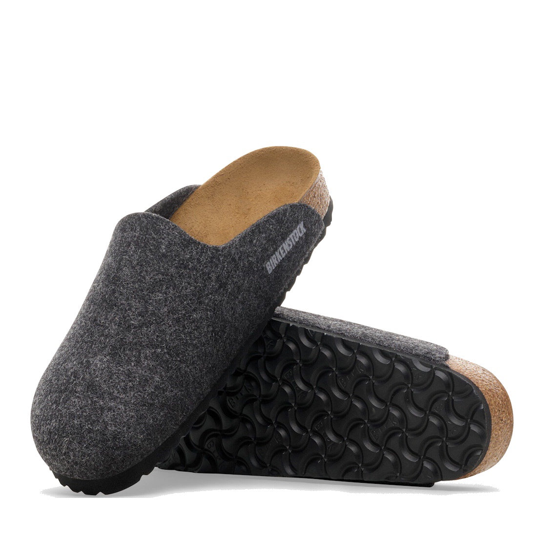 A pair of Birkenstock Amsterdam Felt Wool Clog Anthracite Grey (Regular Width) is shown: one stands upright and the other lies on its side, displaying the textured black sole and cork footbed.