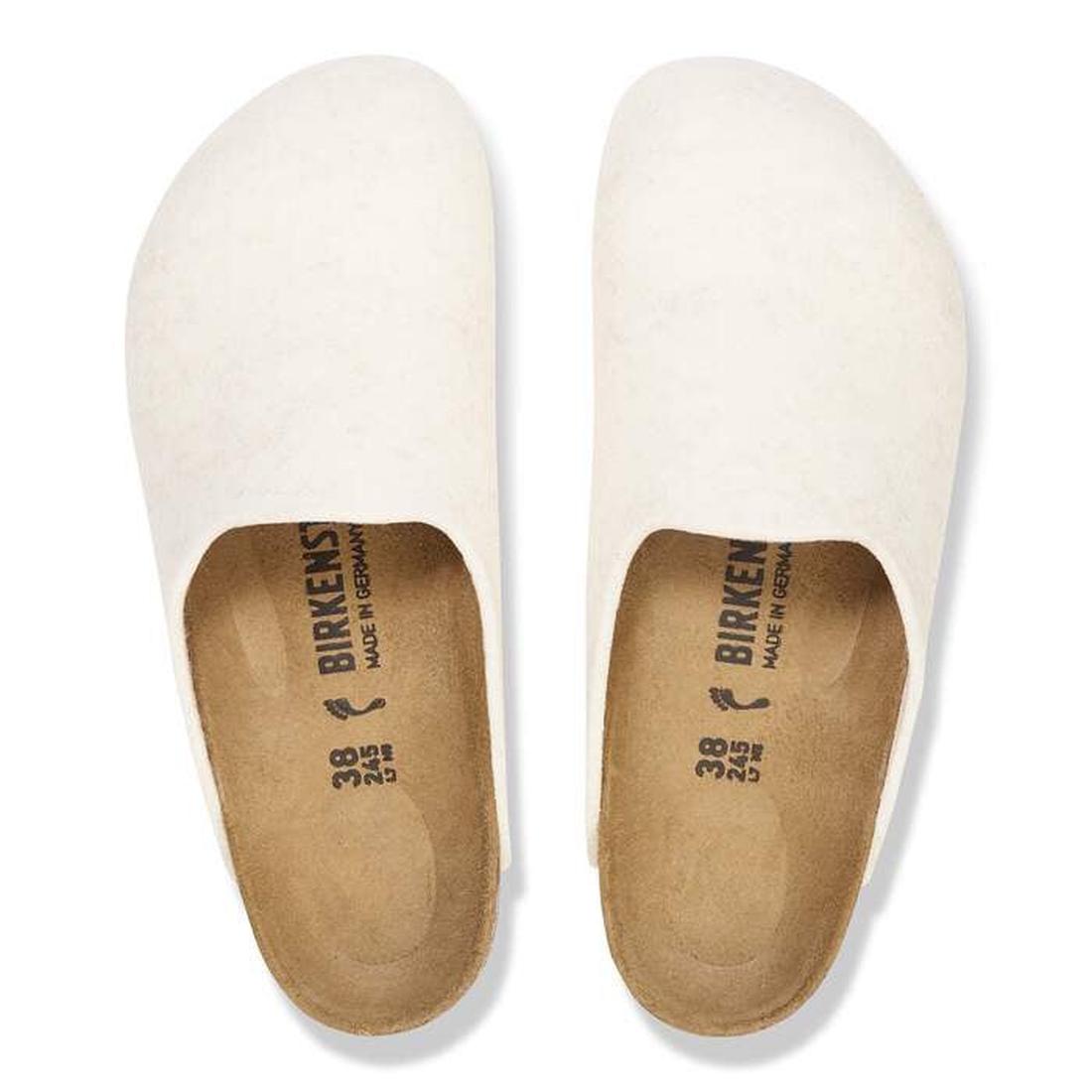 A pair of Birkenstock Amsterdam Felt Wool Clogs in Eggshell Off White (Regular Width) viewed from above, showing the tan cork-latex footbeds, size markings, and “Birkenstock” logo on the insoles., 51708, 51709, 4067707298440, 4067707298488, 4067707298525,, 4067707298563