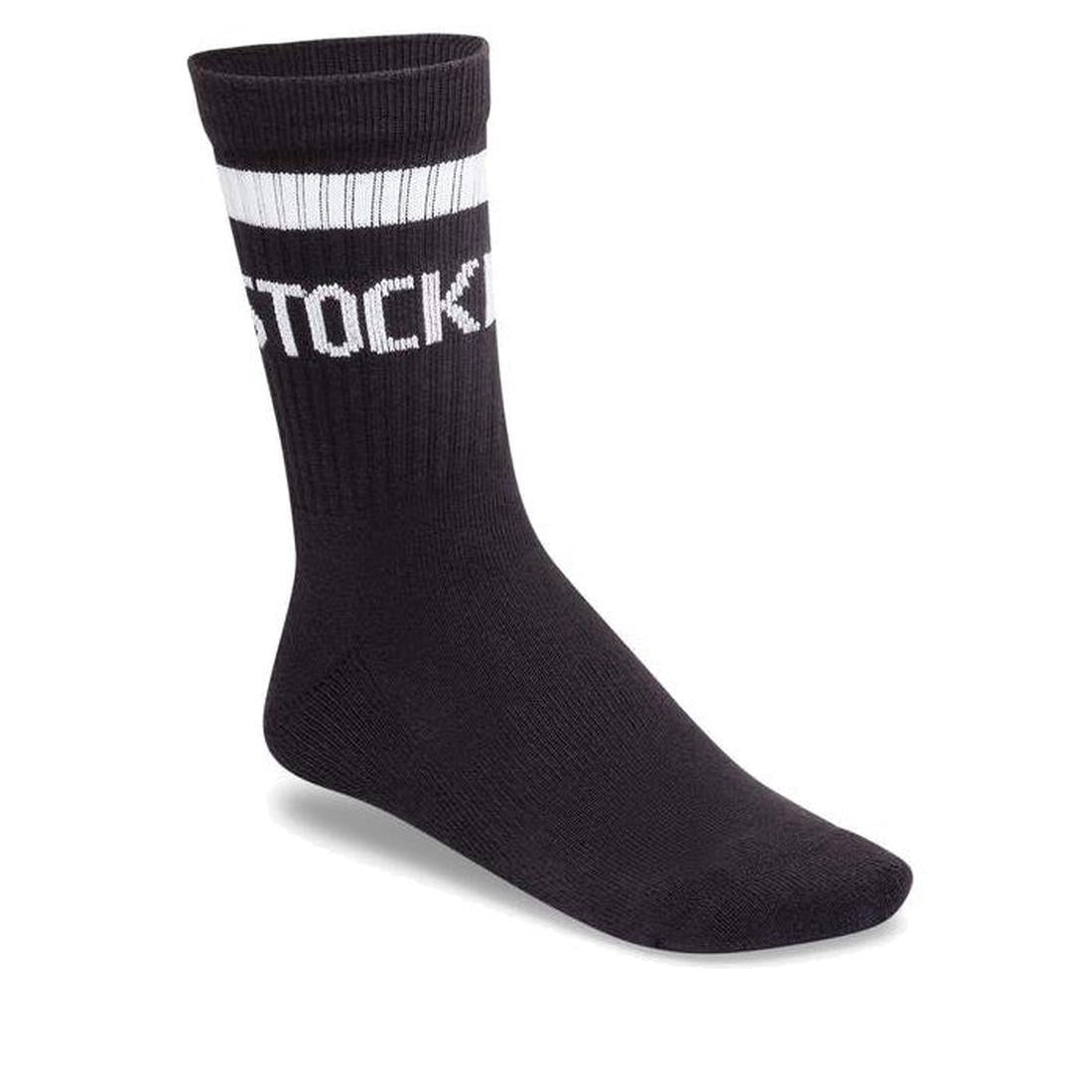 The BIRKENSTOCK Crew Tennis Striped Socks Black feature two white stripes and partial 'STOCK' text on the cuff, shown on a white background, and provide an ultra-soft comfort sole.