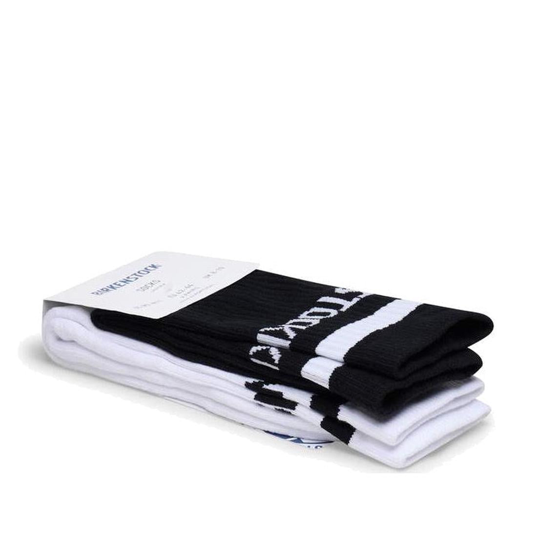 The BIRKENSTOCK Crew Cotton Tennis Striped Socks 2 Pair Pack in Black/White, made from organic cotton for softness, features bold stripes, branding, a comfort sole, and comes neatly folded with a branded cardboard label.