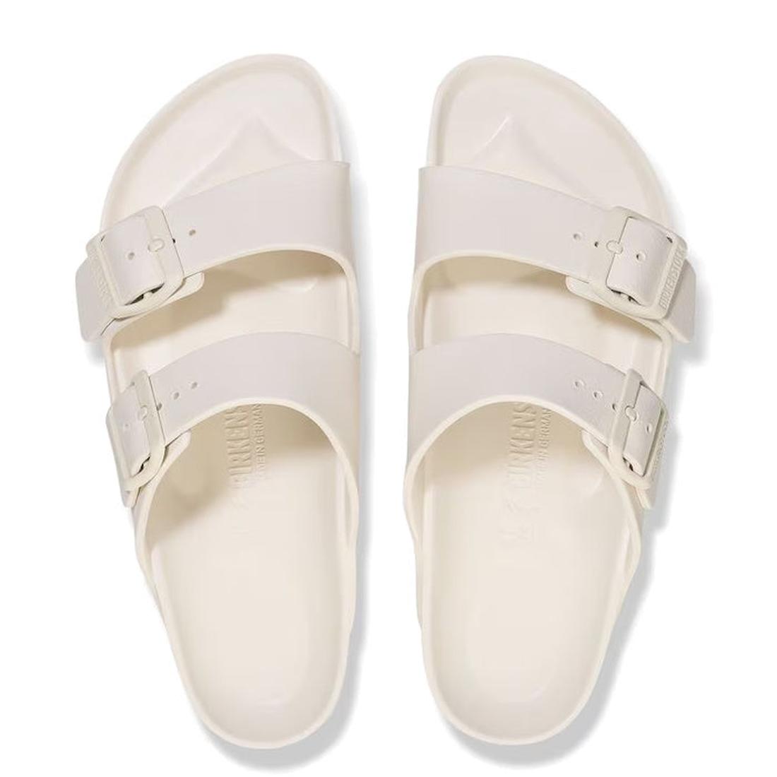 A pair of Birkenstock Arizona EVA Eggshell Off White sandals in narrow width, featuring two adjustable buckle straps and a comfortable EVA footbed, shown from above on a white background., 47533, 47534, 4066648352167, 4066648352204, 4066648352242, 4066648