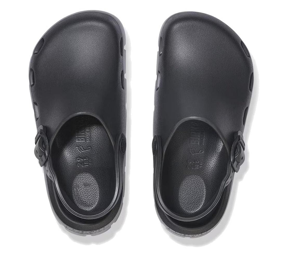A pair of Birkenstock Kids EVA Black Birki-Flow Clog Sandals with closed toes and adjustable buckles, shown from above on a white background—stylish, water-friendly shoes ideal for daily wear., 47658, 47659, 47660, 4067707090402, 4067707090440, 4067707090