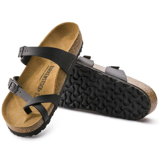 a pair of Birkenstock Mayari Womens Birko Flor Black NARROW Width- thin strappy sandals with bubkle adjustment over the foot and on the outside of the foot near the toe area. Straps cross cross over the toes and a separate strap over the top of the foot. 