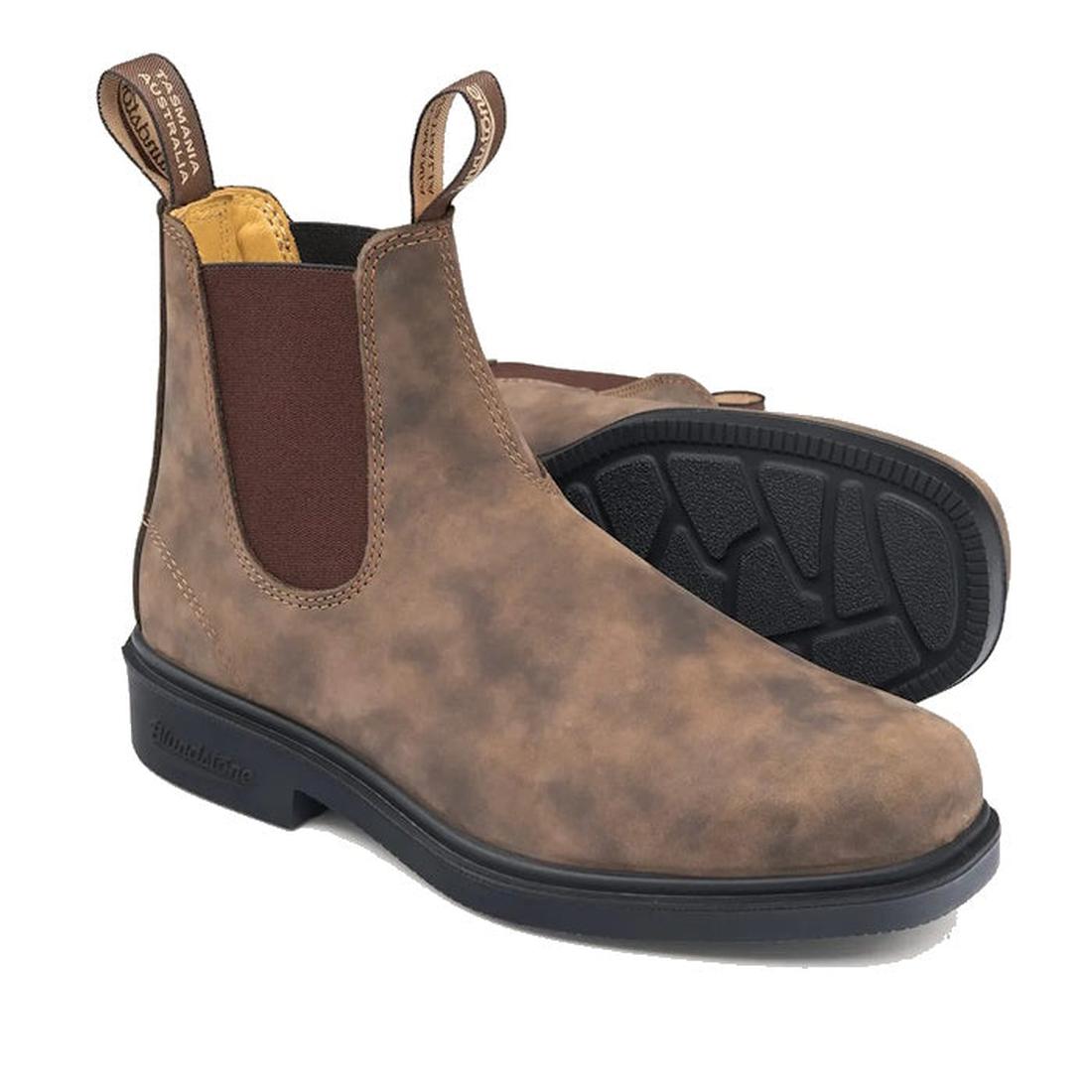 a pair of blundstone brown 1306 chelsea boots. One showing the side and upper, the other showing part of the sole.