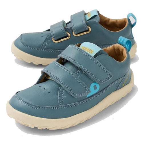 The Bobux IW Iwalk Dawn Toddlers Leather Sneaker in Stormy Weather Blue has a soft zero drop sole, easy velcro straps, and cozy lining.  ksnz