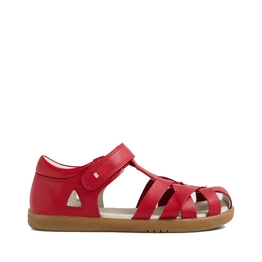 The Bobux Kids Plus KP Tropicana II Salsa Red Closed Toe Leather Sandal features a water-resistant red leather upper, multiple straps, a closed heel, open toe, tan rubber sole, and hook-and-loop closure. Displayed on a plain white background., 94200748653