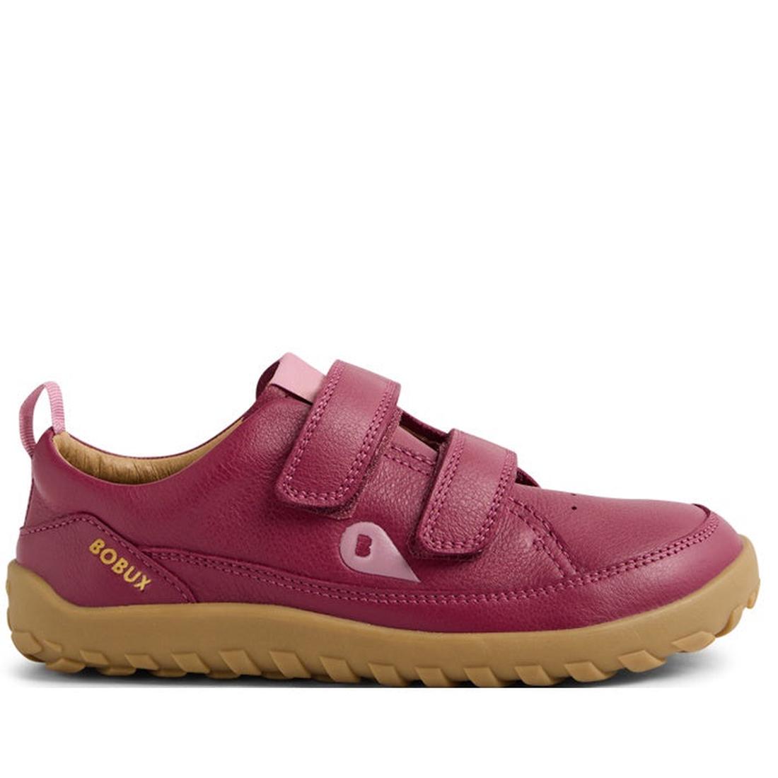 The Bobux Kid+ Dawn Leather Sneaker in Beaujolais Purple is a kids’ shoe with a tan rubber sole, barefoot-shaped toe-box, two velcro straps, yellow BOBUX branding on the side, textured sole, and a small loop at the heel., 9420074826350, 9420074826367, 942