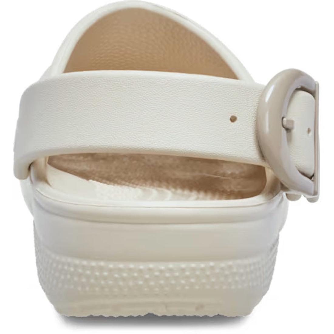 A close-up rear view of the Crocs Adults Classic Enamel Buckle Clog Frappe, showing its thick Croslite foam sole, textured footbed, and a wide back strap with a round buckle on the right for signature Crocs Comfort., 198445415944, 198445415951, 1984454159