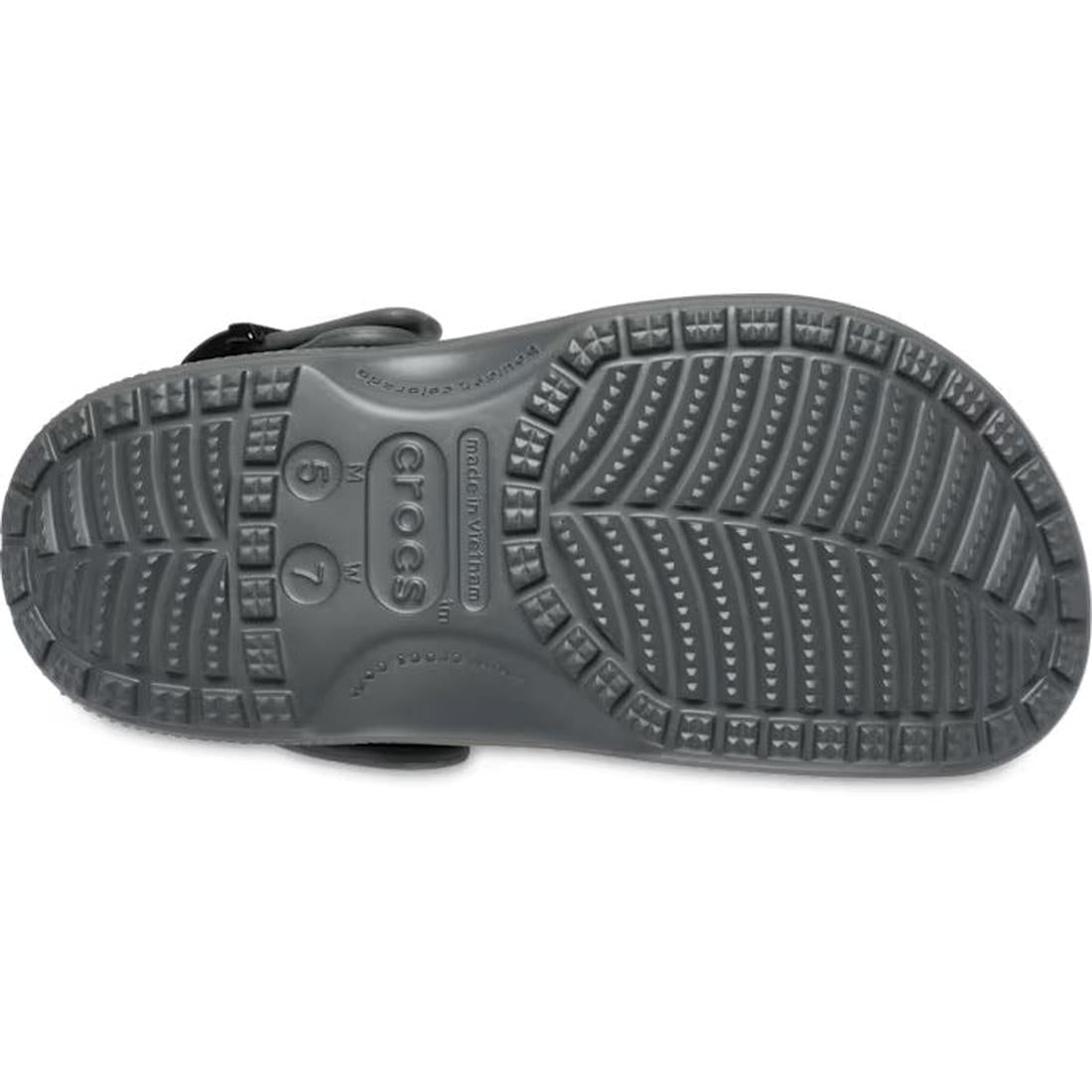 The underside of the Crocs Adults Classic Enamel Buckle Clog Carbon Grey reveals detailed tread, size markings 6 7, and the Crocs logo molded into its Croslite foam sole., 51696, 198445415715, 198445415722, 198445415739, 51700, 51701, 51696, 198445415715,