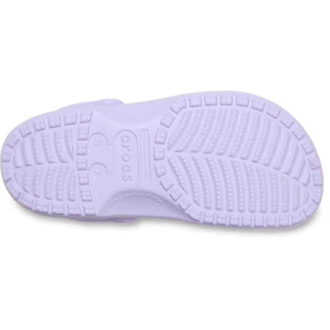 The image displays the sole of a Crocs Classic Clog Purple Halo Adults Unisex shoe, featuring textured tread patterns and "Crocs" embossed in the center alongside size markings 6 and 7, all crafted to provide Iconic Crocs Comfort., 198445490996, 198445491