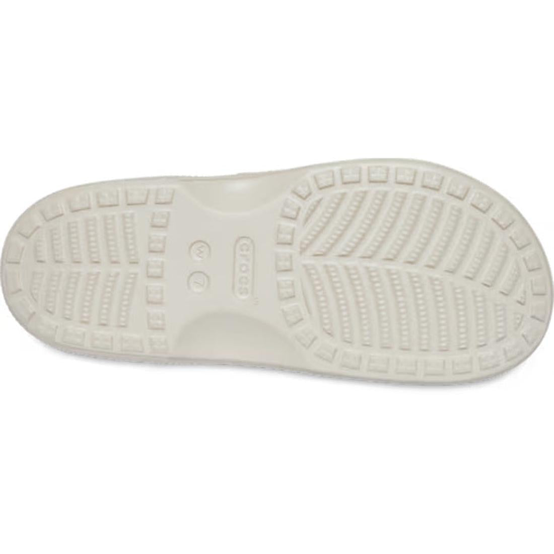 The image shows the bottom sole of a white Crocs shoe, displaying its distinctive tread pattern and the Crocs logo in the center—a testament to Crocs comfort found in styles like the Crocs Womens Saturday Enamel Buckle Frappe Sandal Slide., 198445417030, 