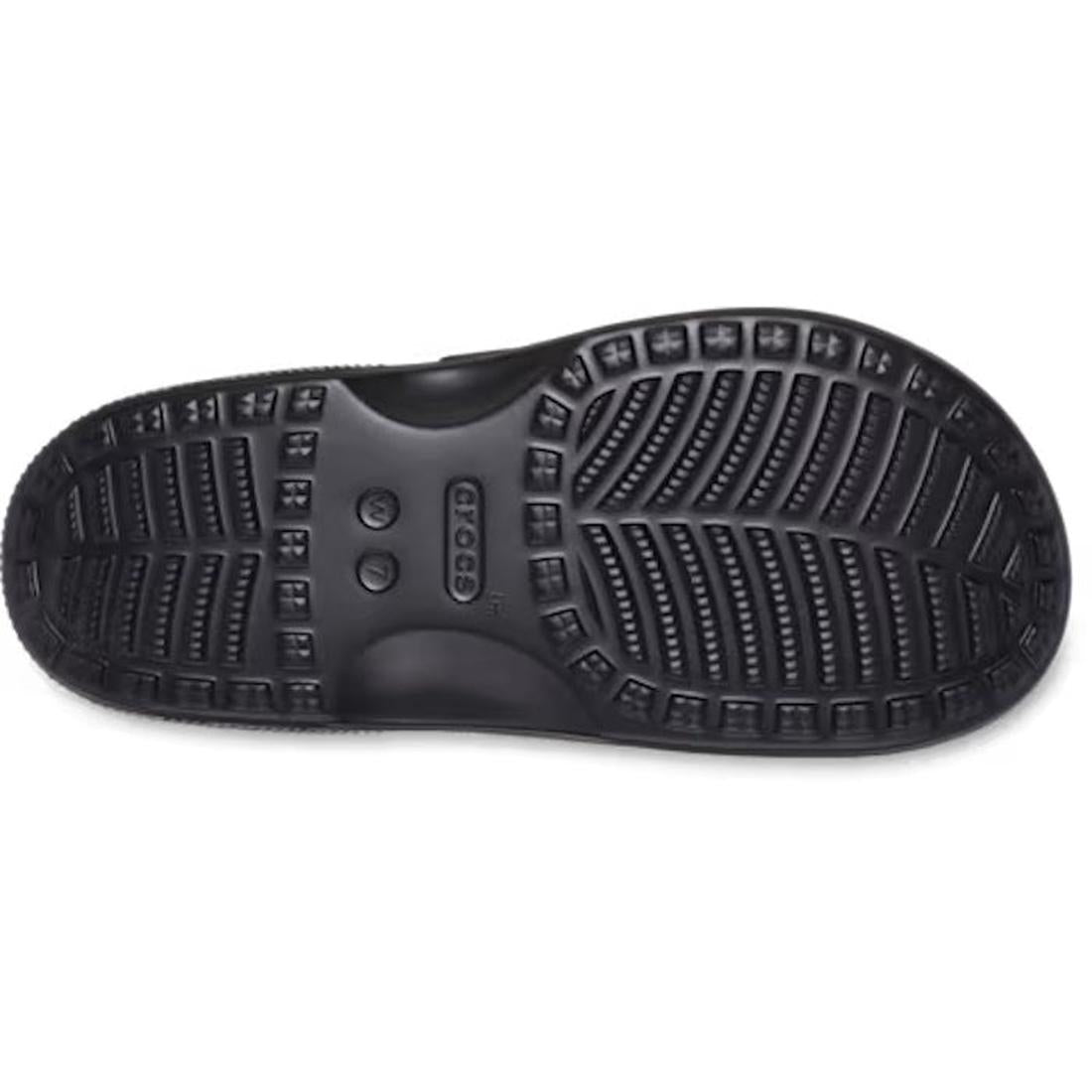 The bottom view of the Crocs Womens Classic Metallic Buckle Saturday Sandal Slide Black reveals its textured non-slip sole with grooves and the Crocs logo at the center, ensuring signature Crocs Comfort for all-day wear., 50021, 198445392788, 198445392795