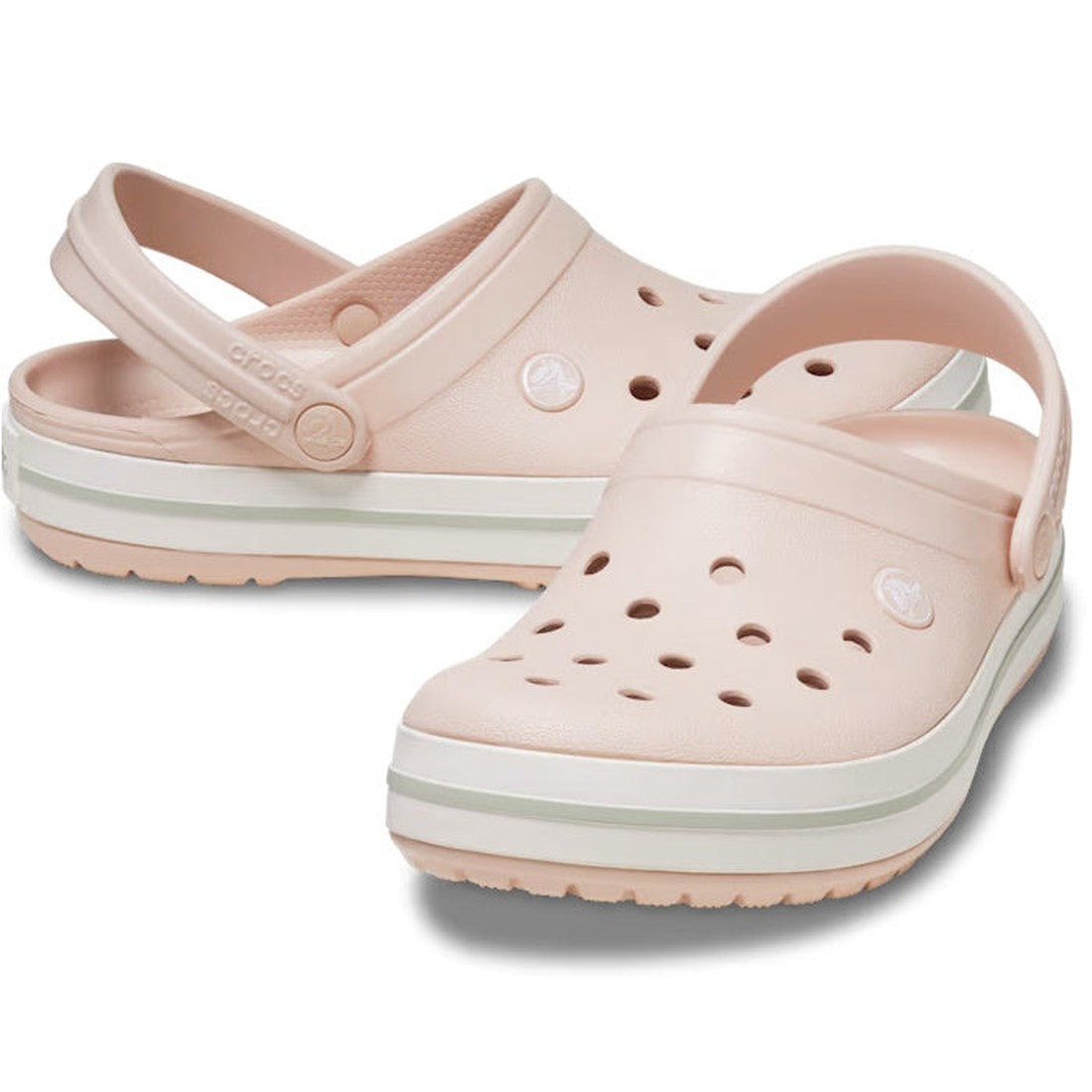 Crocs Crocband Clog Quartz Pink Womens are comfy clogs in soft pink, with striped soles, air holes, and secure heel straps for easy play.  ksnz