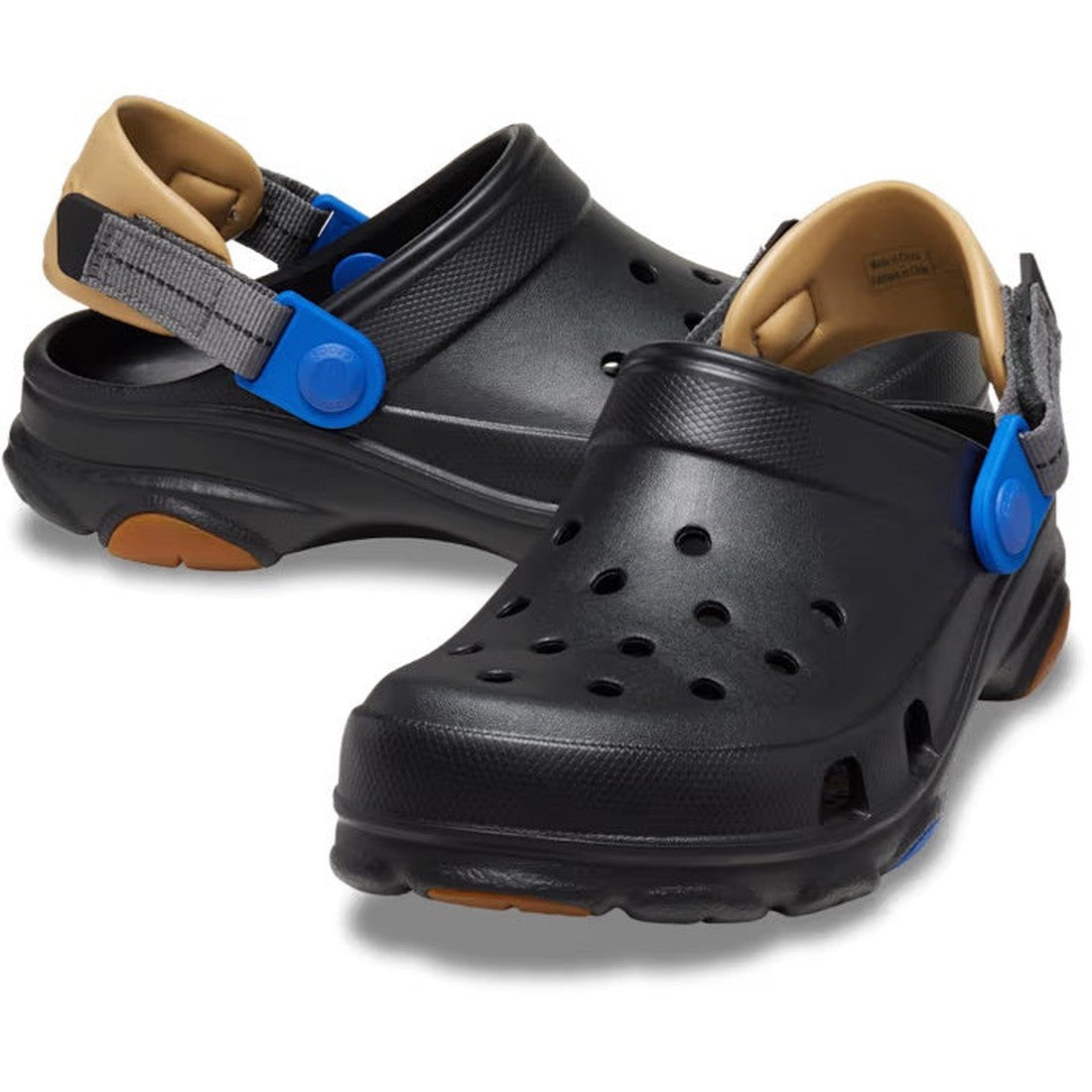 Crocs Kids Classic All-Terrain Clog Black Gum keeps little feet comfy with a tan padded interior, sturdy soles, and secure blue-gray straps.  ksnz