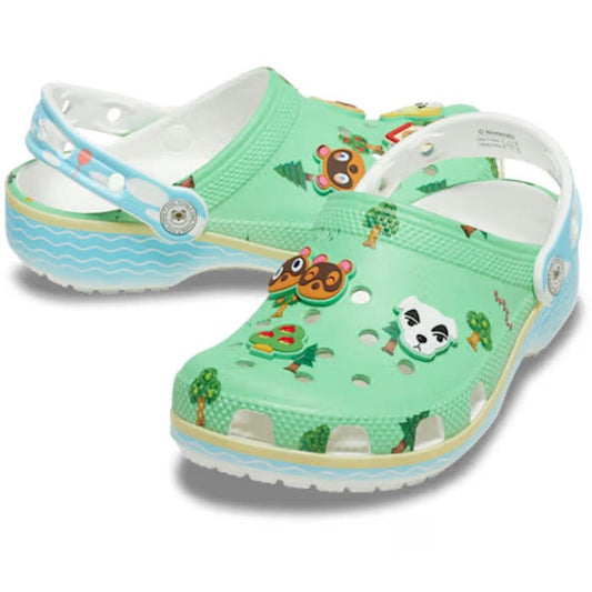 Pair of youths Juniors light green clogs with animal crossing prints on a white background