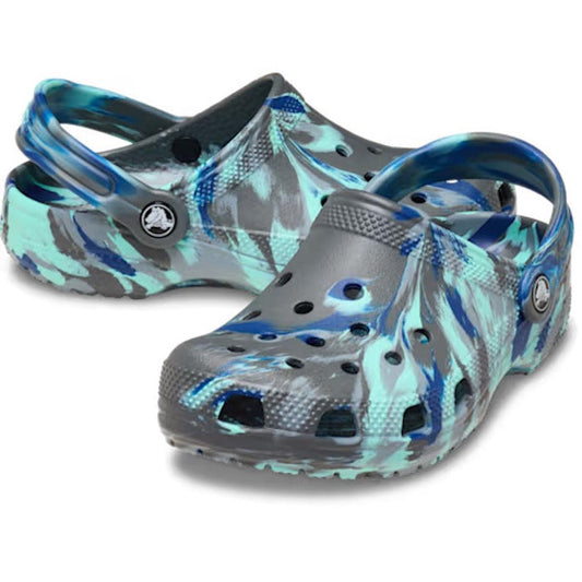 Two Crocs Kids Classic Clog Marbled Carbon Multi Youth slip-ons featuring a marbled effect of grey, blue, and teal.