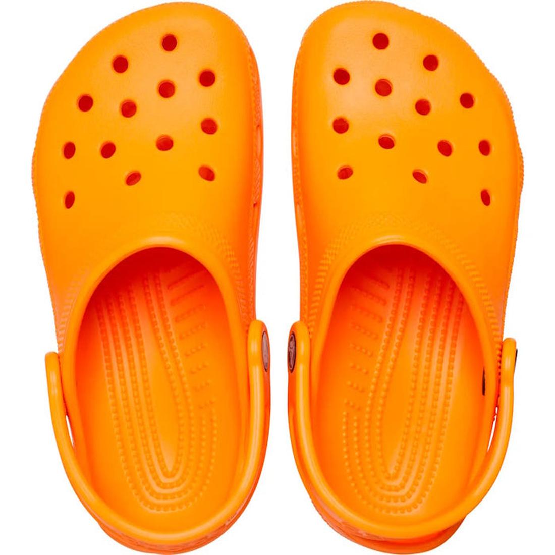 A pair of Crocs Kids - Classic Clog Orange Zing in junior youth sizes, lightweight and water-friendly with top ventilation holes and adjustable back straps, viewed from above on a white background., 191448894051, 191448894068, 191448894075, 191448894082, 