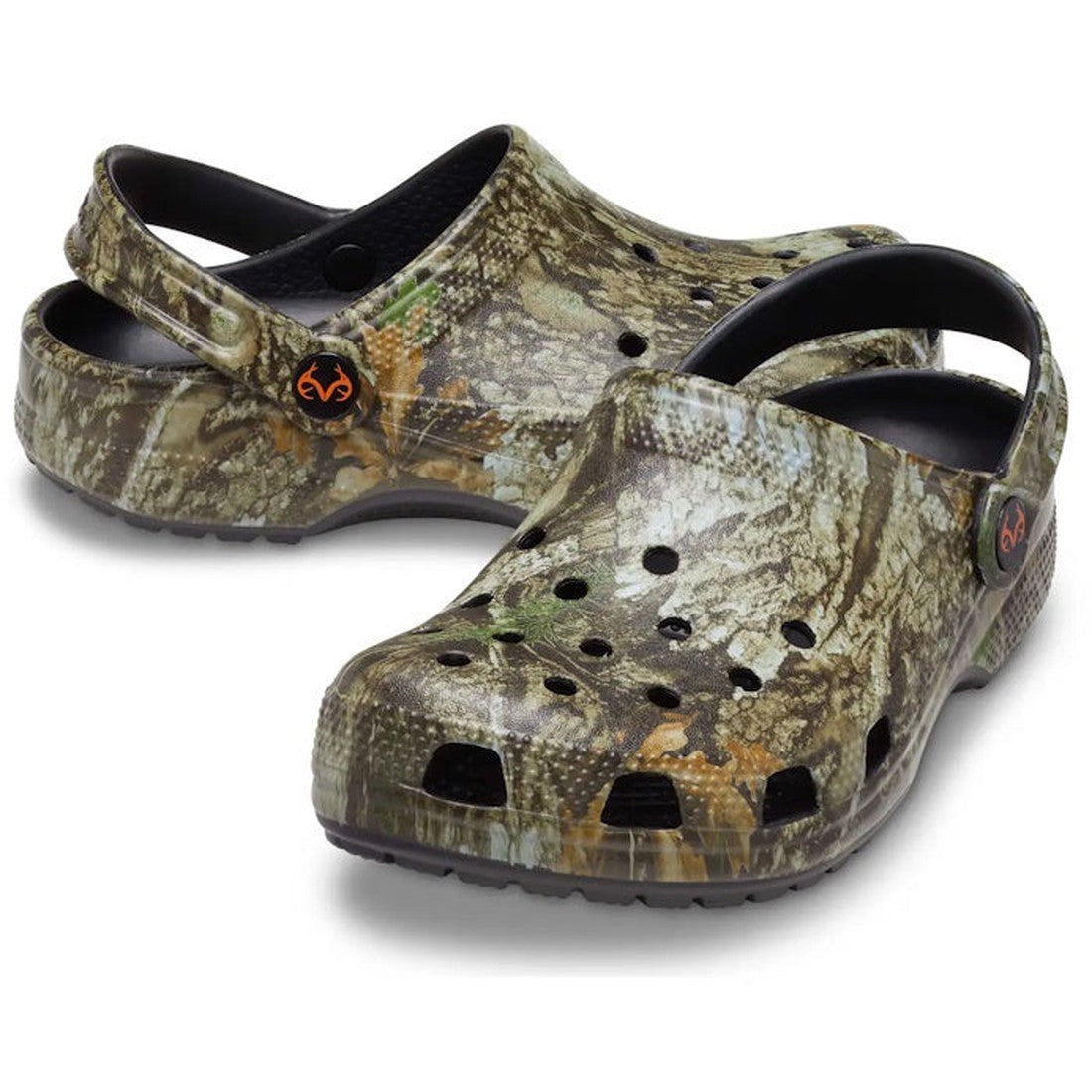 A pair of Crocs Classic Clog Realtree APX Adults Unisex camo clogs with ventilation holes and adjustable heel straps, shown on a white background, offer comfort and iconic style.