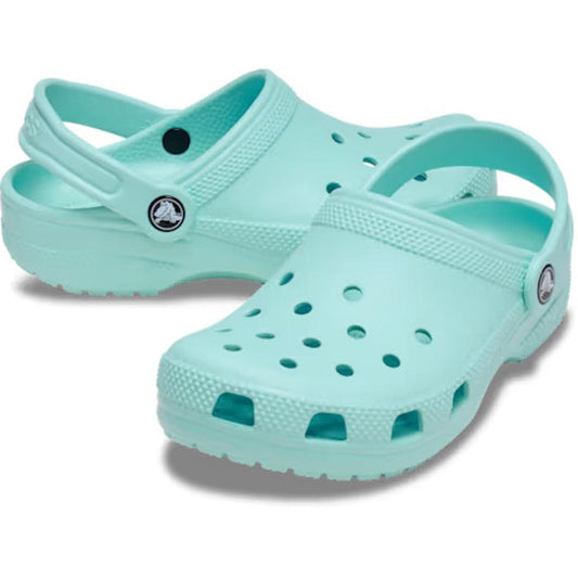 The Crocs Toddlers Aquamarine Classic Clog features ventilation holes and a back strap, shown slightly overlapping on a white background—lightweight, water-friendly sandals ideal for active little feet.