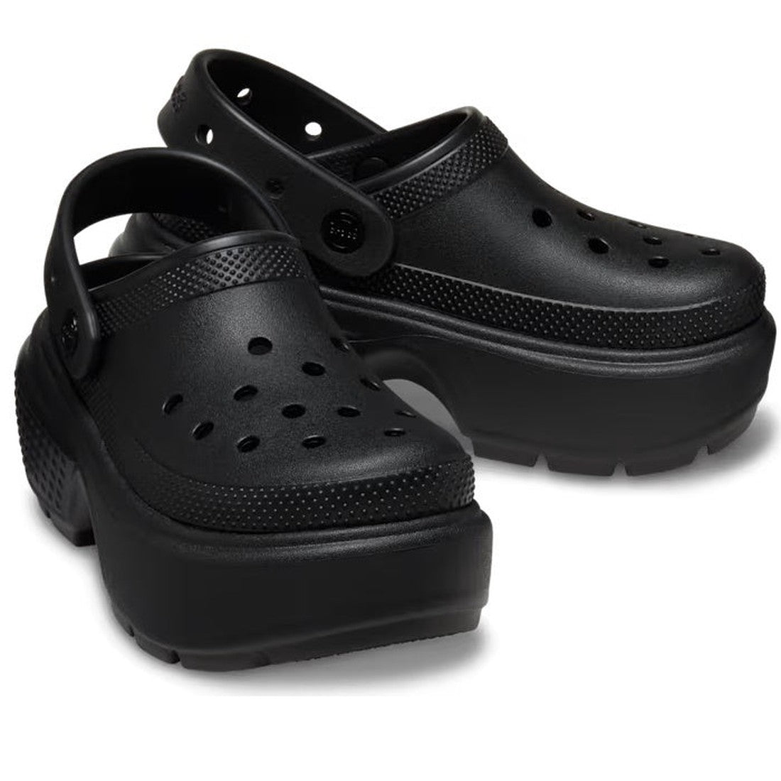 The Crocs Stomp Classic Clog Adults Black Platform features chunky soles, ventilation holes, and an adjustable heel strap—offering bold style inspired by classic Crocs from the Stomp Collection. Now on clearance.