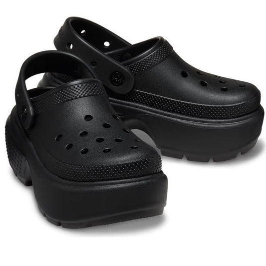 The Crocs Stomp Classic Clog Adults Black Platform features chunky soles, ventilation holes, and an adjustable heel strap—offering bold style inspired by classic Crocs from the Stomp Collection. Now on clearance.