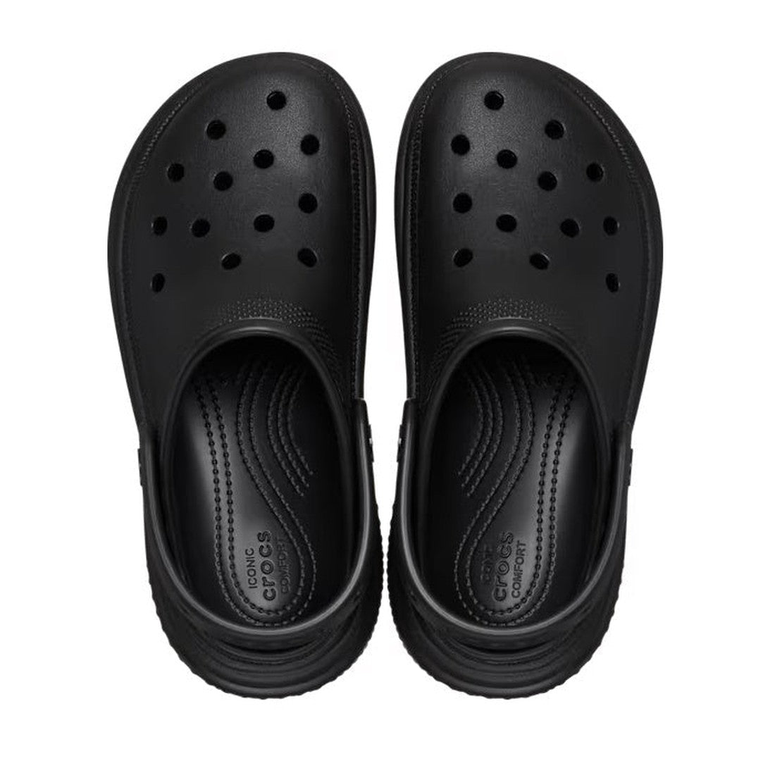 A pair of Crocs Stomp Classic Clog Adults in black, viewed from above, showcasing chunky platform soles, ventilation holes, and textured footbeds. Now on clearance., 38823, 196265595419, 196265595426, 196265595433, 196265595440, 196265595457, 38829, 38830