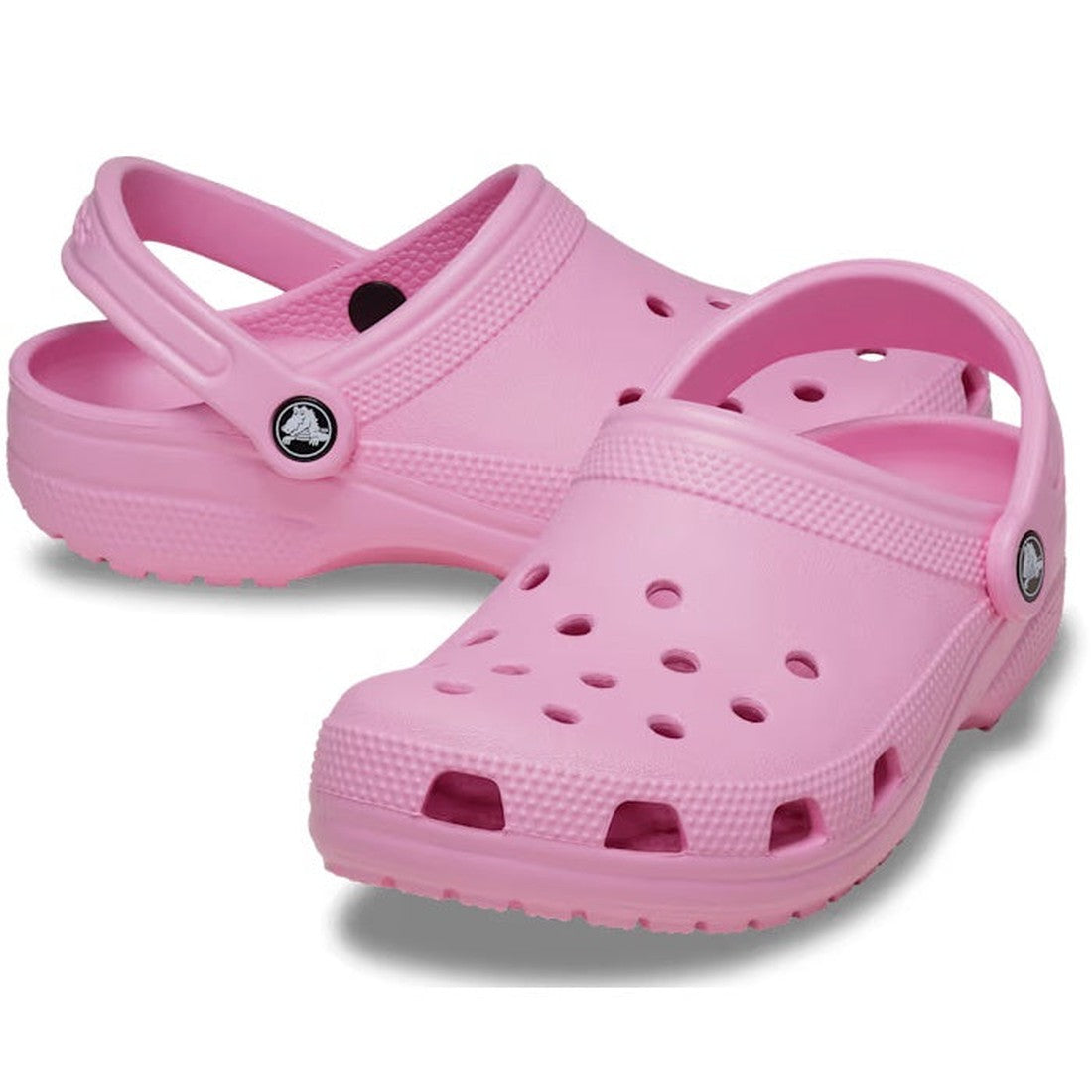Classic Clog Pink Tweed Adults by Crocs—pink slip-ons with comfy soles, easy back straps, and airy holes, side by side on white.  ksnz