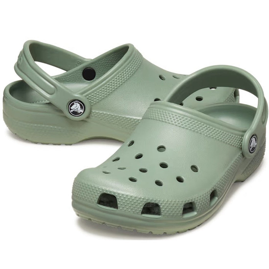 Crocs Kids Classic Clog in Moss Green offers little feet cushy soles, airy toe holes, and a secure adjustable heel strap for active play.  ksnz
