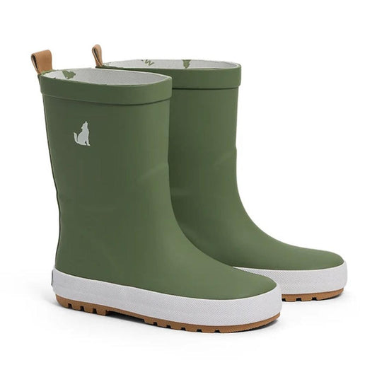 CryWolf Rain Boots Olive are children’s rain boots crafted from natural rubber in an olive green shade, with white soles and brown treads. Each waterproof kids boot features a small white wolf silhouette on the upper outer side.