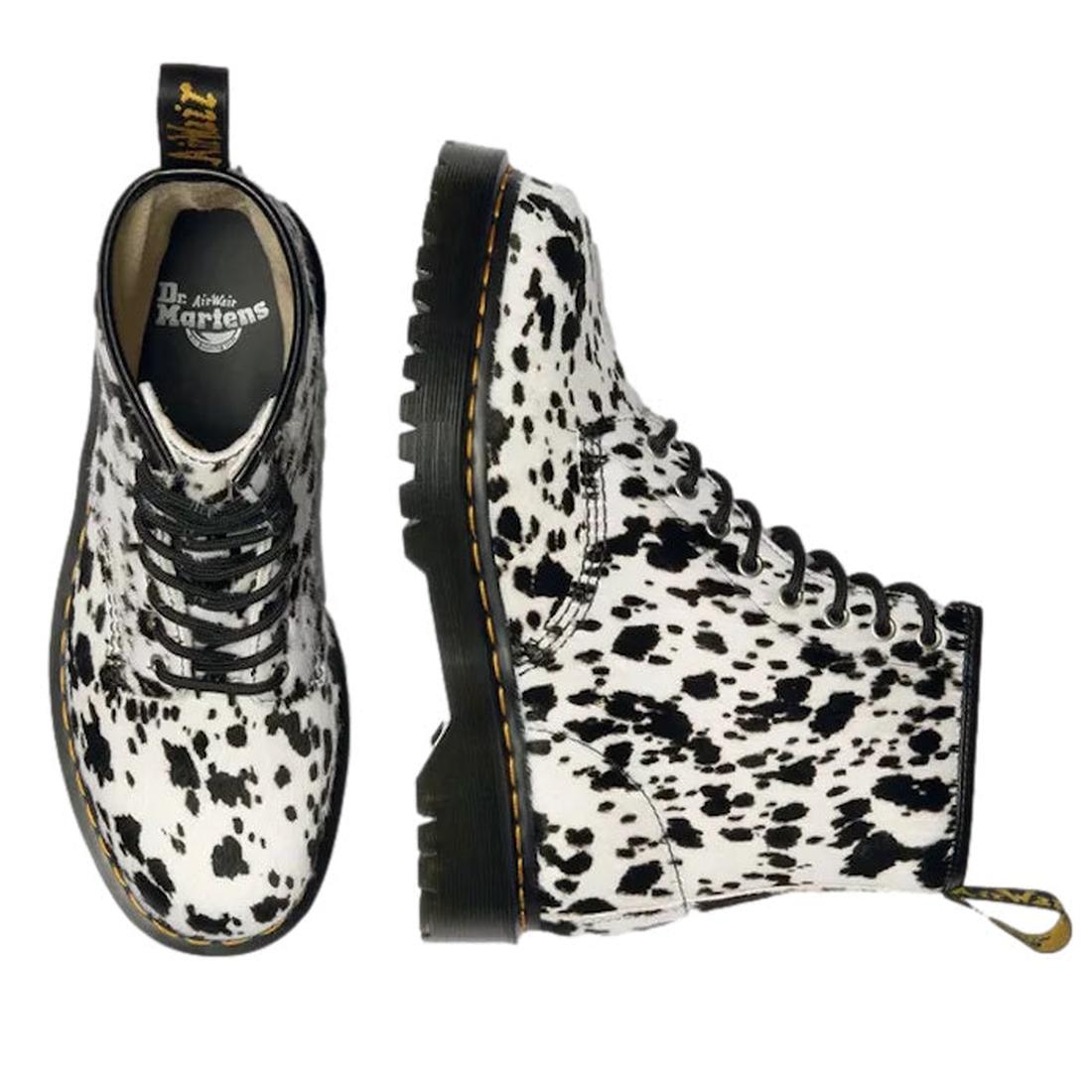 The Dr Martens 1460 Bex Dalmatian Hair On Leather Lace Up Boot is shown from the top and side against a white background, featuring a distinctive Dalmatian print crafted from hair-on leather., 190665780307, 190665780314, 190665780321, 190665780345, 190665