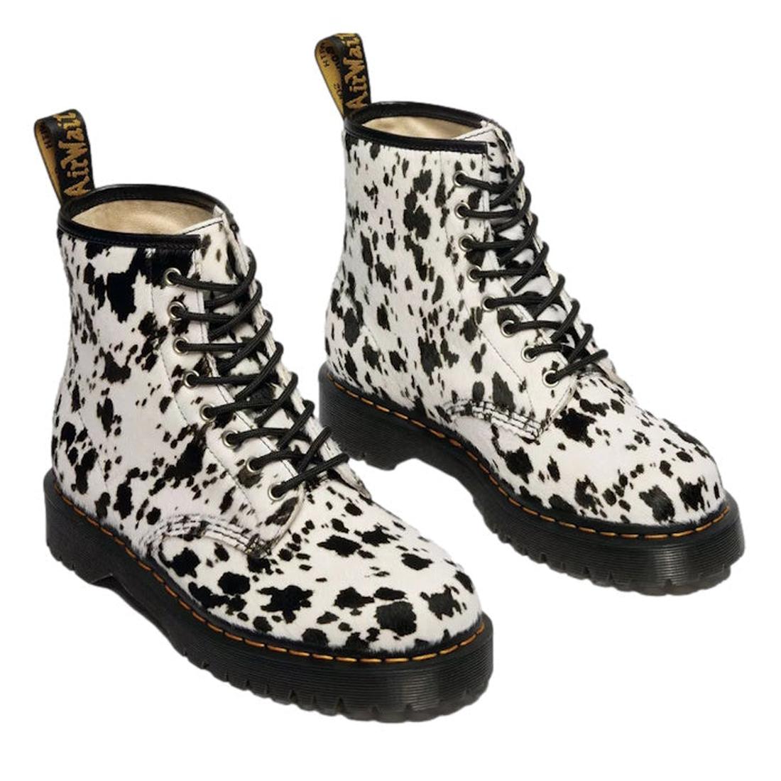 Dr Martens 1460 Bex Dalmatian Hair On Leather Lace Up Boot features a white hair-on leather upper with Dalmatian spots, black soles, yellow stitching on a Goodyear welted sole, and a black-and-yellow branded heel loop., 190665780307, 190665780314, 1906657