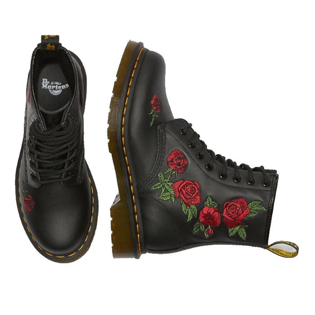 The Dr. Martens 1460 Vonda Red Roses Softy T Leather Boot features black leather, AirWair Bouncing Soles, yellow stitching, and red embroidered roses with green leaves, shown from top and side views on a white background., 190665206036, 190665206043, 1906
