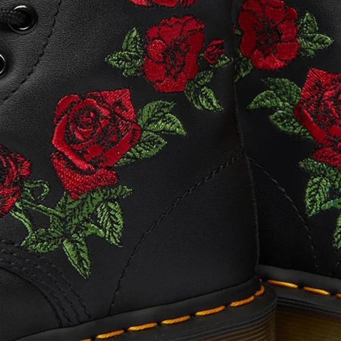 Close-up of the Dr Martens 1460 Vonda Red Roses Softy T Leather Boot, showcasing bright red embroidered roses with green leaves, signature yellow stitching on the sole, and classic AirWair Bouncing Soles., 190665206036, 190665206043, 190665206050, 1906652