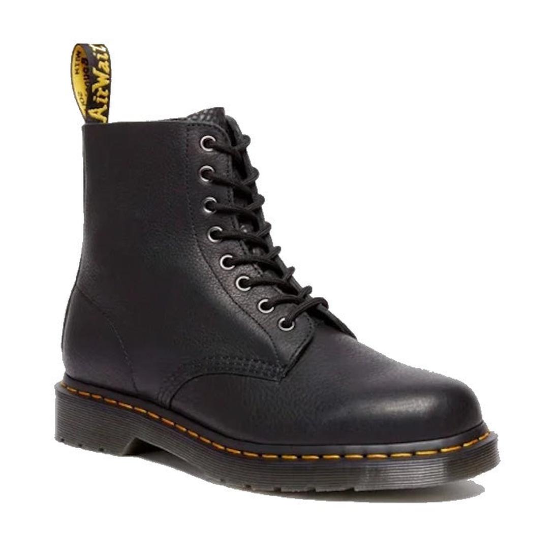 The Dr. Martens 1460 Pascal Ambassador Black Leather boot, with yellow stitching, a Goodyear-welted sole, and a yellow pull tab, is shown laced up in black leather against a white background.