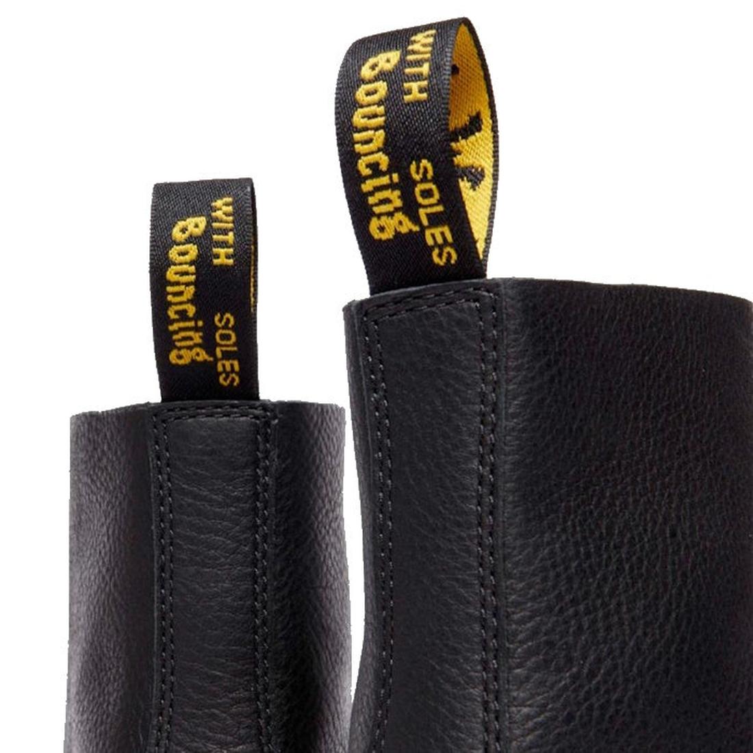 Close-up of two Dr. Martens 1460 Pascal Ambassador Black Leather boots, showing the yellow and black “WITH BOUNCING SOLES” pull loops atop their Goodyear-welted design; only the boot tops and loops are visible., 46779, 190665663136, 190665663143, 19066566
