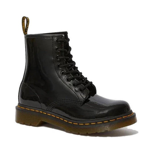 A black patent leather Dr. Martens 1460 8-eye boot with yellow welt stitching and a round toe.