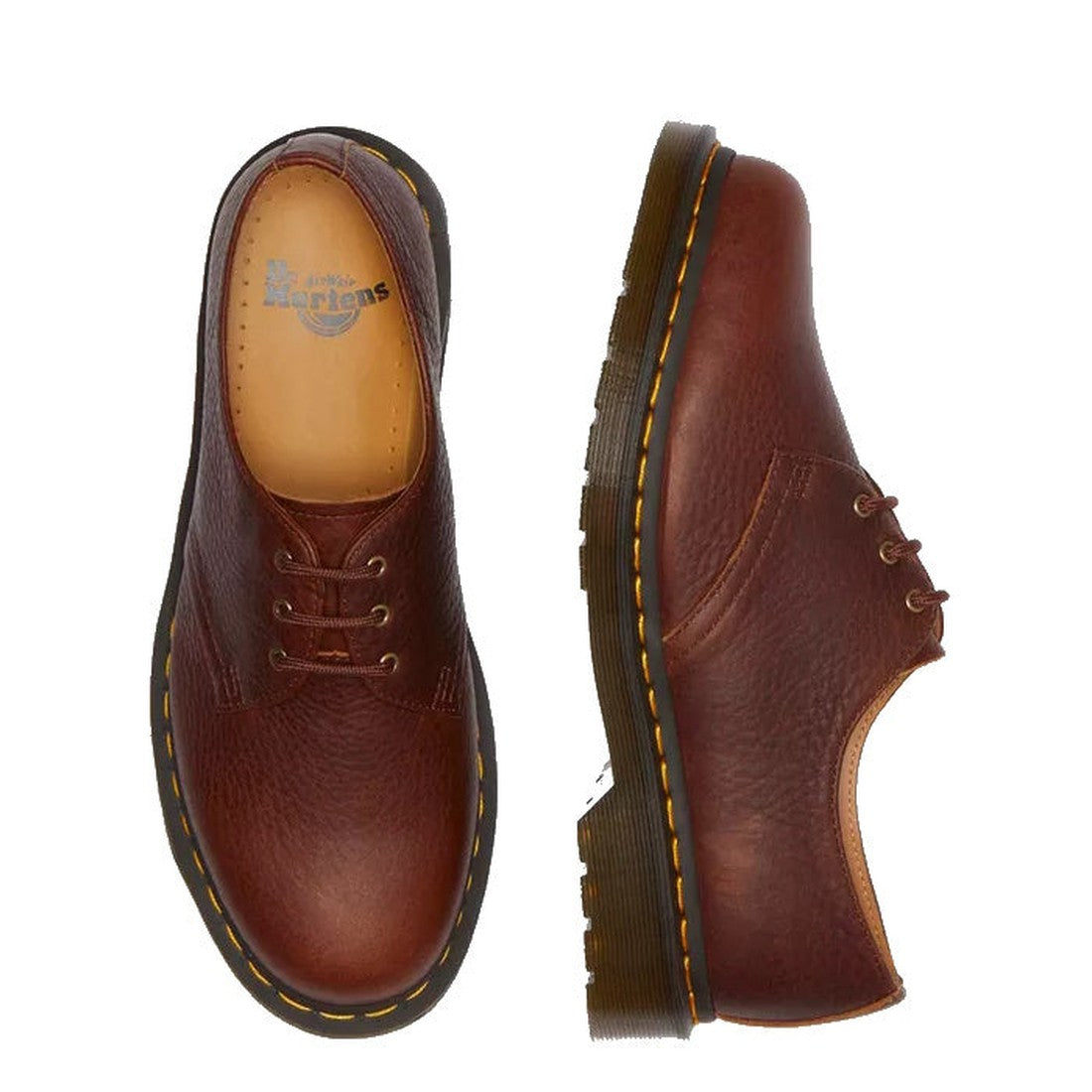 Dr. Martens 1461 Shoes in Cashew Tan Ambassador textured leather, shown from top and side, feature 3-eye lace-up design, yellow Goodyear-welt stitching on AirWair sole, and tan insoles with Dr. Martens branding.