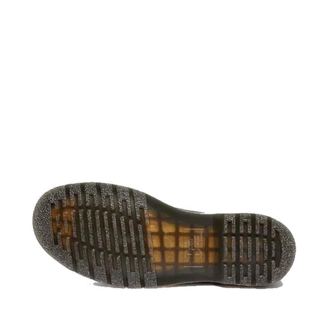 The image shows the underside of a Dr Martens 2976 Ambassador Black Leather Chelsea Boot with a translucent rubber sole featuring a grid pattern and horizontal ridges, displayed on a plain white background., 50056, 50057, 50059, 190665663303, 190665663310