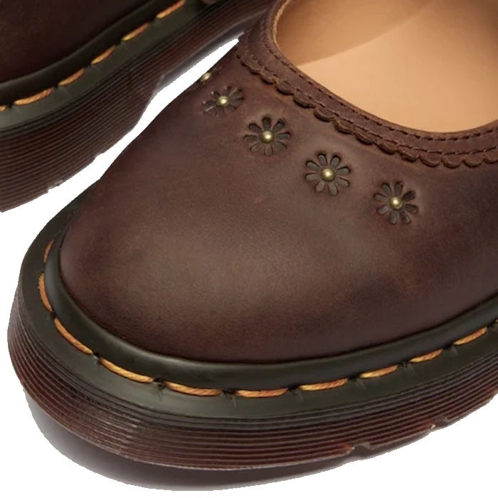 Dr Martens Mary Jane Flower shoes in dark brown, with pretty flower cutouts, secure buckle closure and sturdy ridged sole.  ksnz, 52079, 190665785531, 190665785548, 190665785555, 190665785579, 190665785586, 190665785593