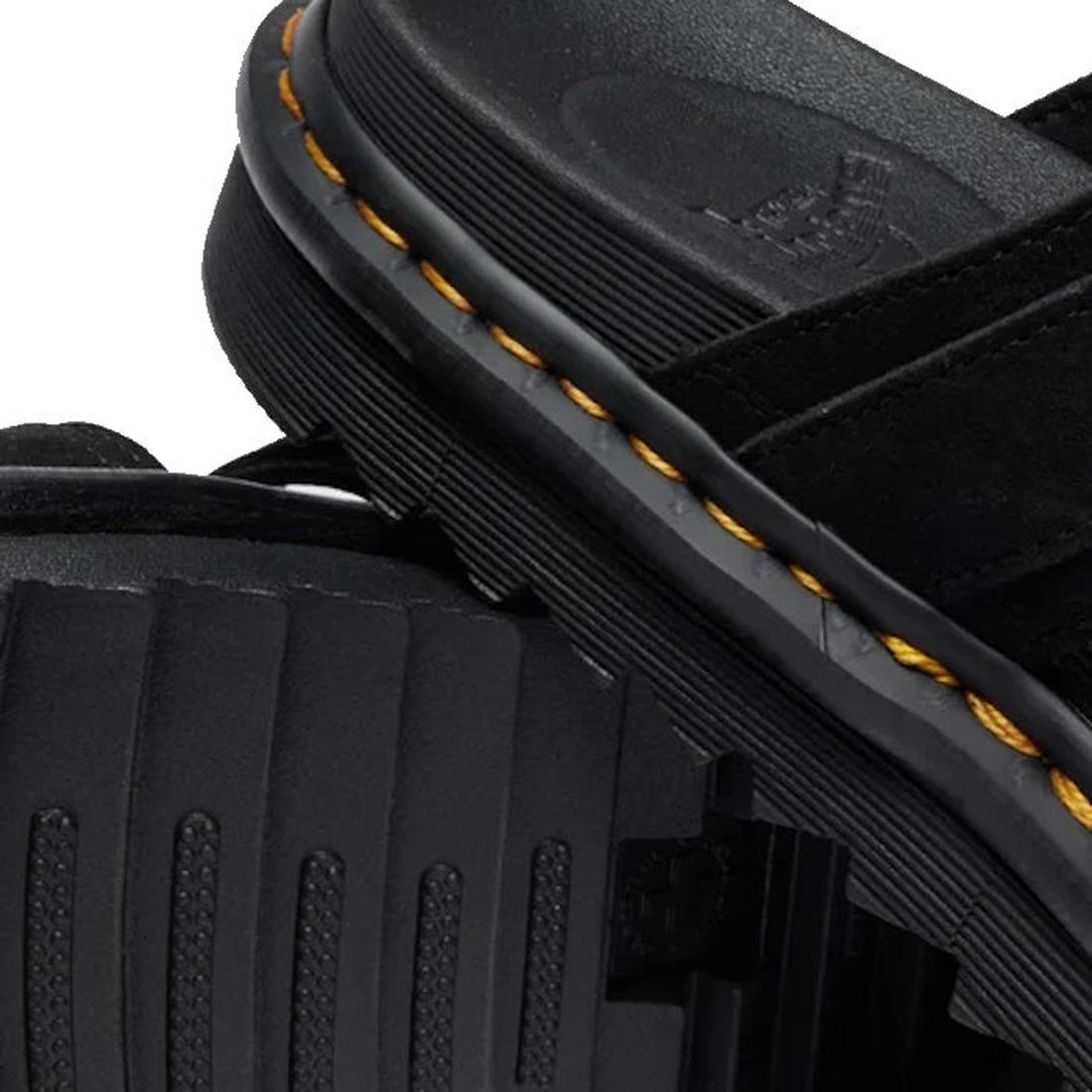 Close-up of Dr Martens Myles Black E.H Long Napped Suede Sandal, featuring thick Zebrilus soles, visible yellow stitching, textured tread bottom, and a suede upper., 49269, 190665796711, 190665796728, 190665796735, 190665796759, 190665796766, 190665796773