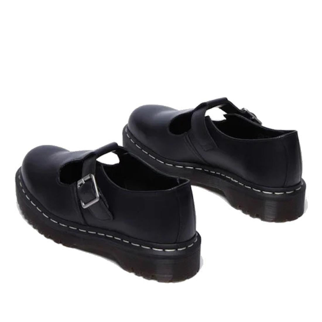 Dr Mrtens Pollet T Bar heel shot of both feet looking forward Black shoes with buckles and white stitching on a white background.,
190665696905,
190665696912,
190665696936,, 45112, 45113, 190665696905, 190665696912, 190665696936, 45118, 45119