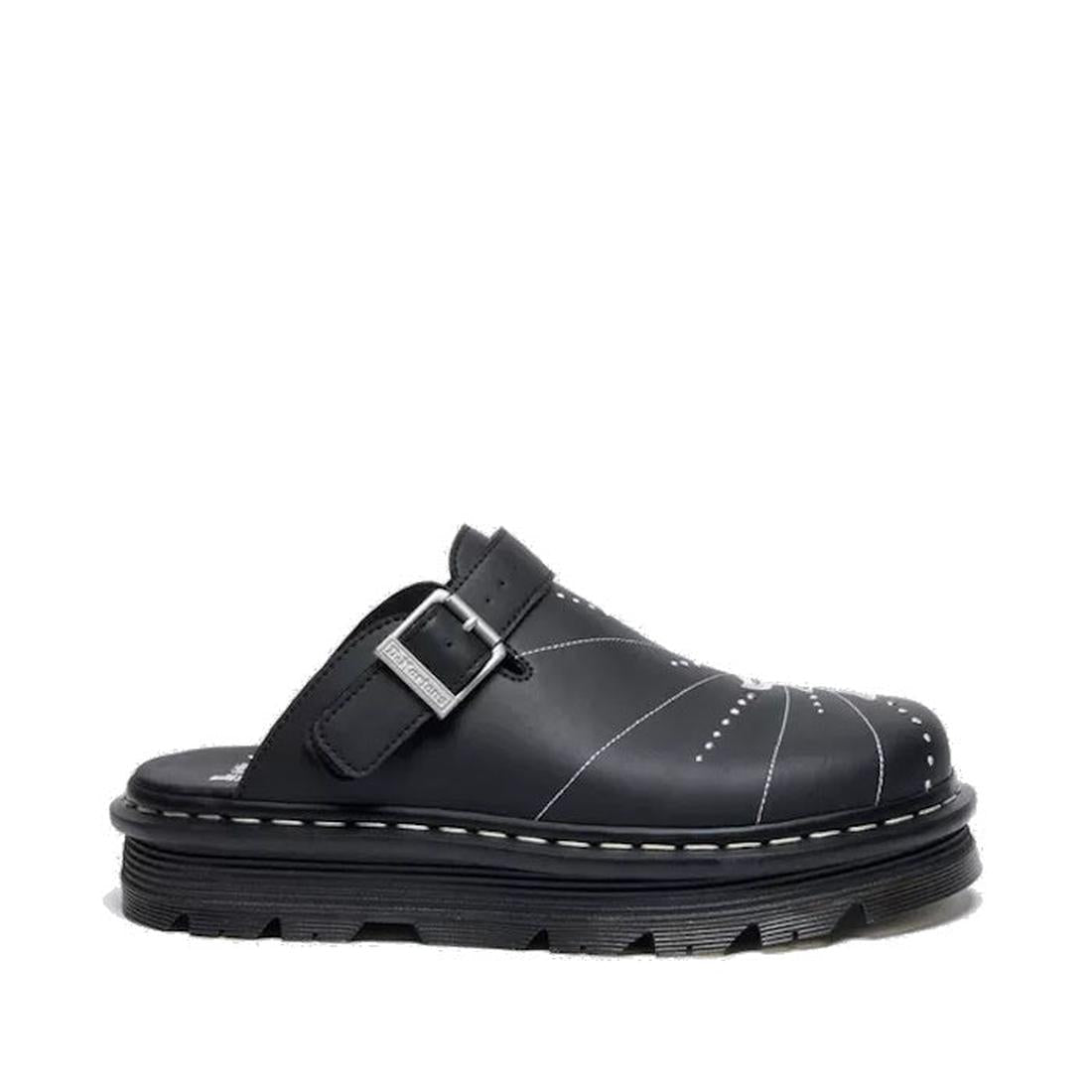 The Dr Martens Zebzag Mule Solar Flare Genix Nappa Black is a black slip-on mule with reclaimed leather, an ergonomic sole, adjustable buckle strap, and white stitching on the upper for a modern, casual look., 190665758818, 190665758825, 190665758832, 190