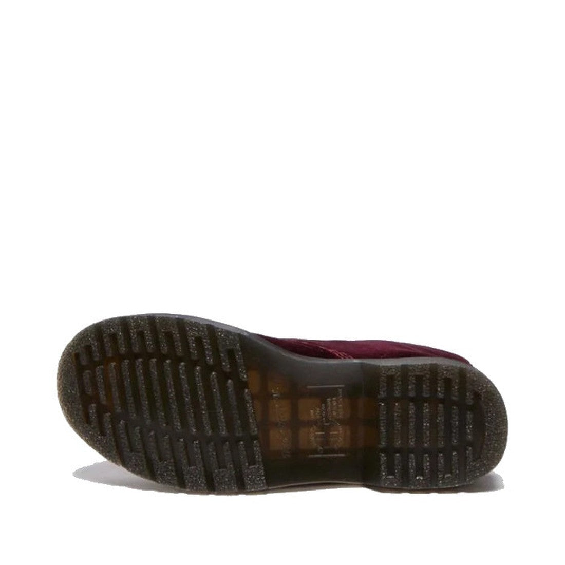 A single Dr Martens 1460 Vegan Pascal Cherry Red Velvet 8 Eye Boot lies on its side, its grooved black rubber sole visible against a white background—a subtle nod to grunge-inspired style., 42020, 190665660616, 190665660623, 190665660630, 190665660654, 19