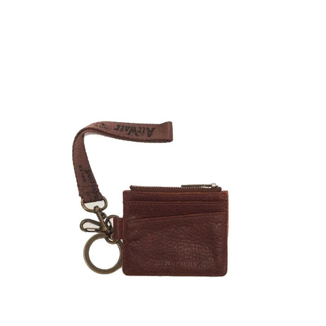 Dr Martens Cardholder Keyring Cashew Ambassador Leather Bag Charm—a small brown leather cardholder with a zipper, two card slots, a metal keyring attachment, and a brown fabric wrist strap with text., 190665739831